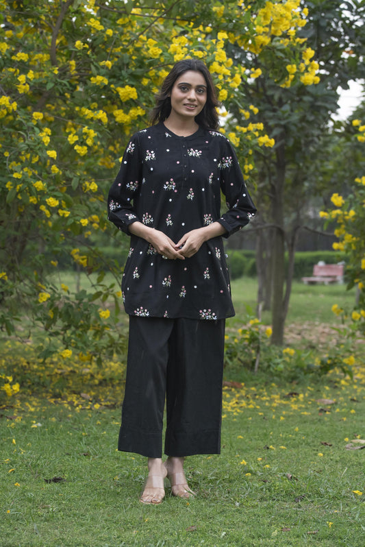 Black floral kurta paired with pant