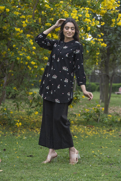 Black floral kurta paired with pant
