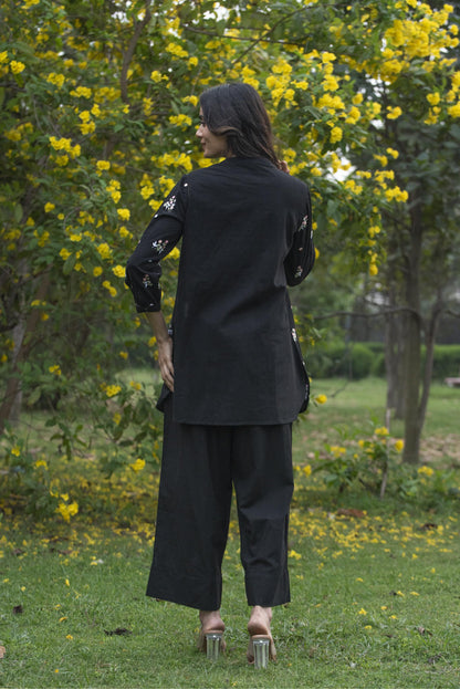 Black floral kurta paired with pant