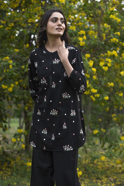 Black floral kurta paired with pant